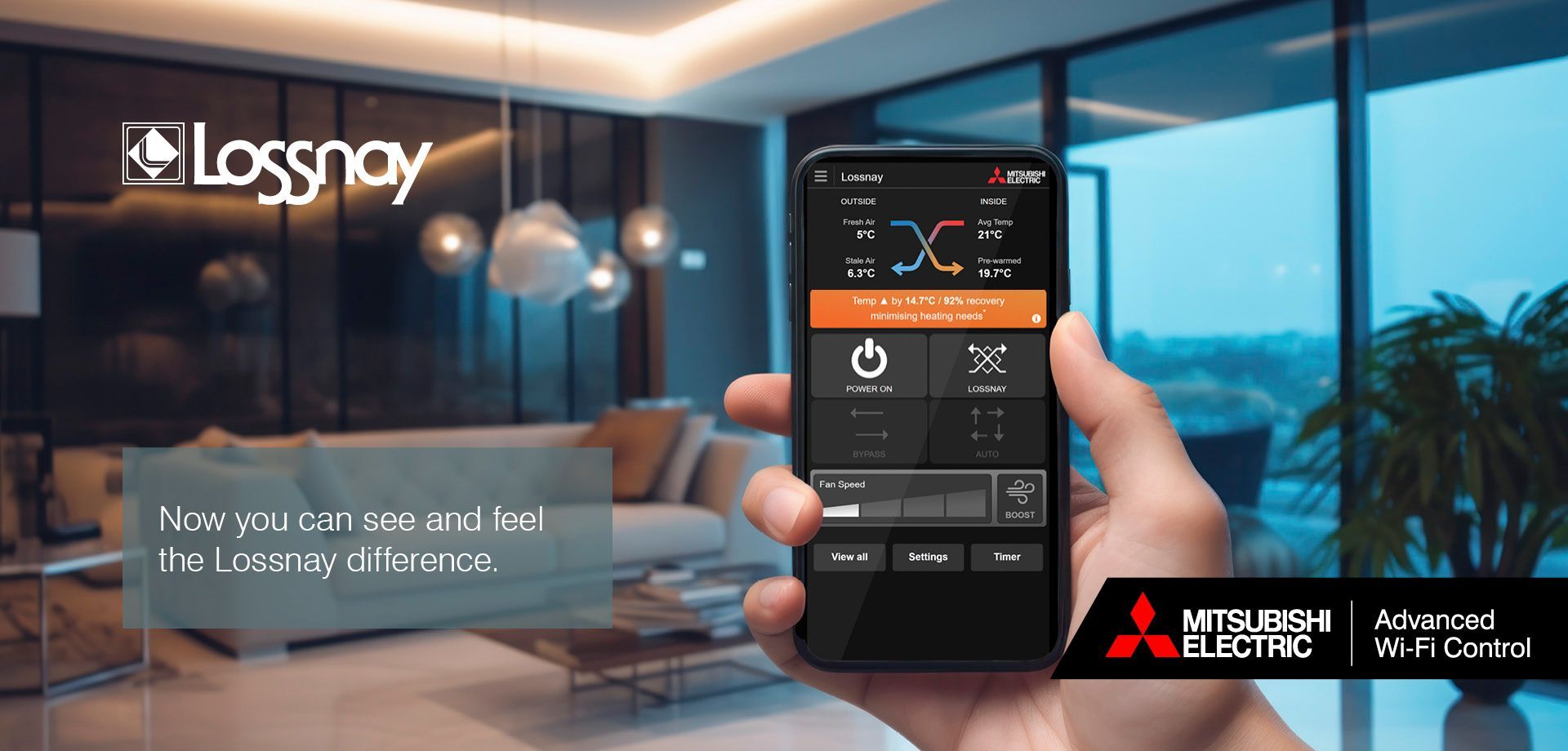 Hand holding mobile phone with Mitsubishi Electric Lossnay Wi-Fi app in lounge.