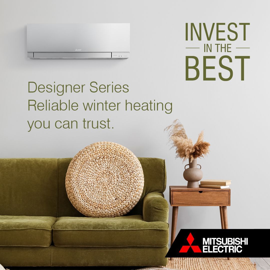 Invest in the Best.  Mitsubishi Electric heat pump above a green sofa.