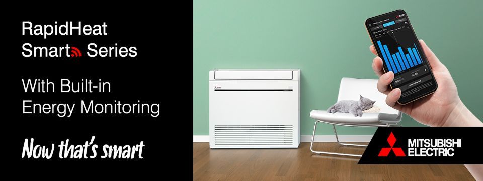 Mitsubishi Electric RapidHeat Smart Series heat pump next to a white chair with a cat, person's hand holding a phone with energy monitoring app.