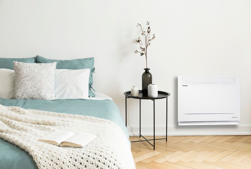 Panasonic floor mounted heat pump in a bedroom