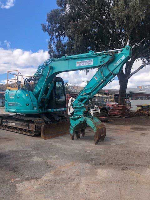 Teal Excavator