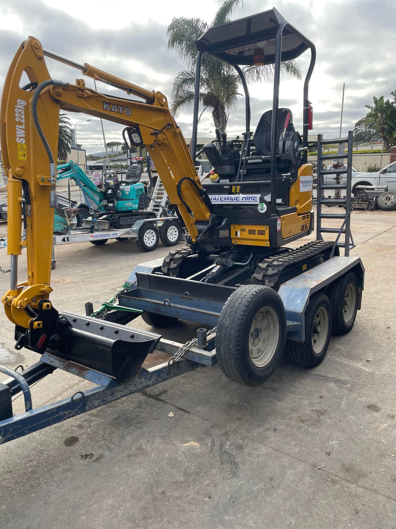 Teal excavator available for excavator hire in Adelaide