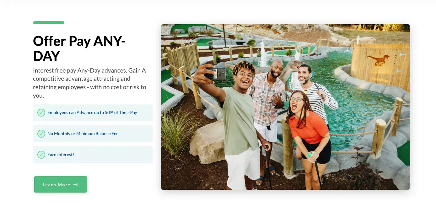 a group of people are taking a selfie at a mini golf course