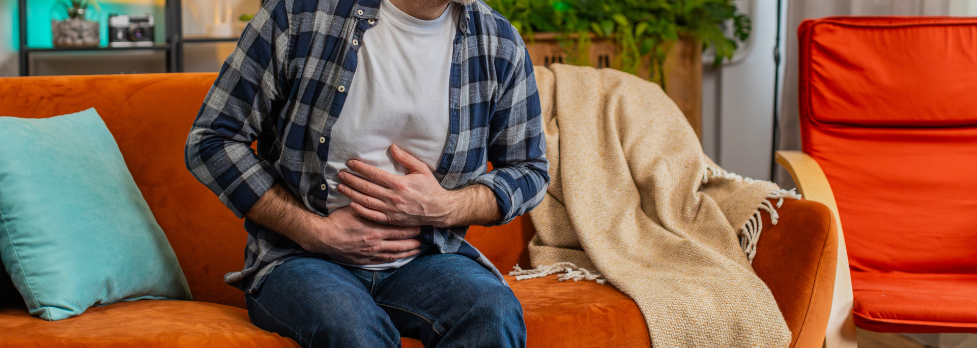 Picture of someone holding their stomach because they are hungry. Picture of someone holding their stomach because they are hungry.
