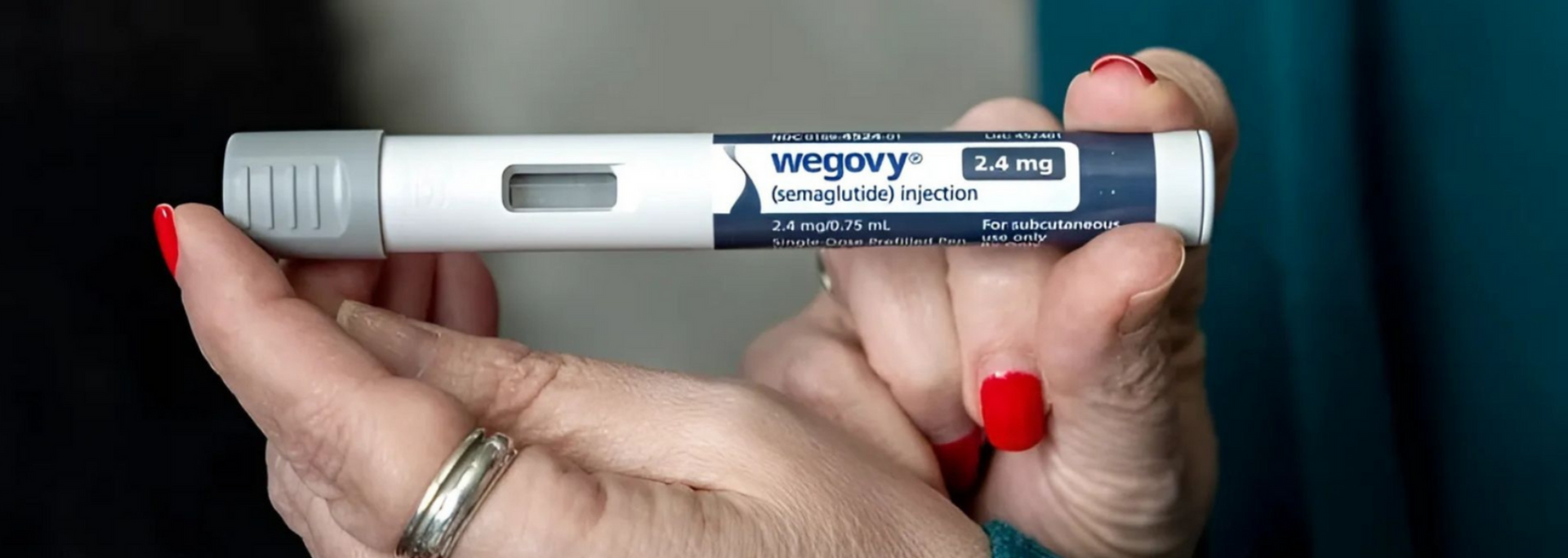 Picture of a Wegovy pen with clear branding. 