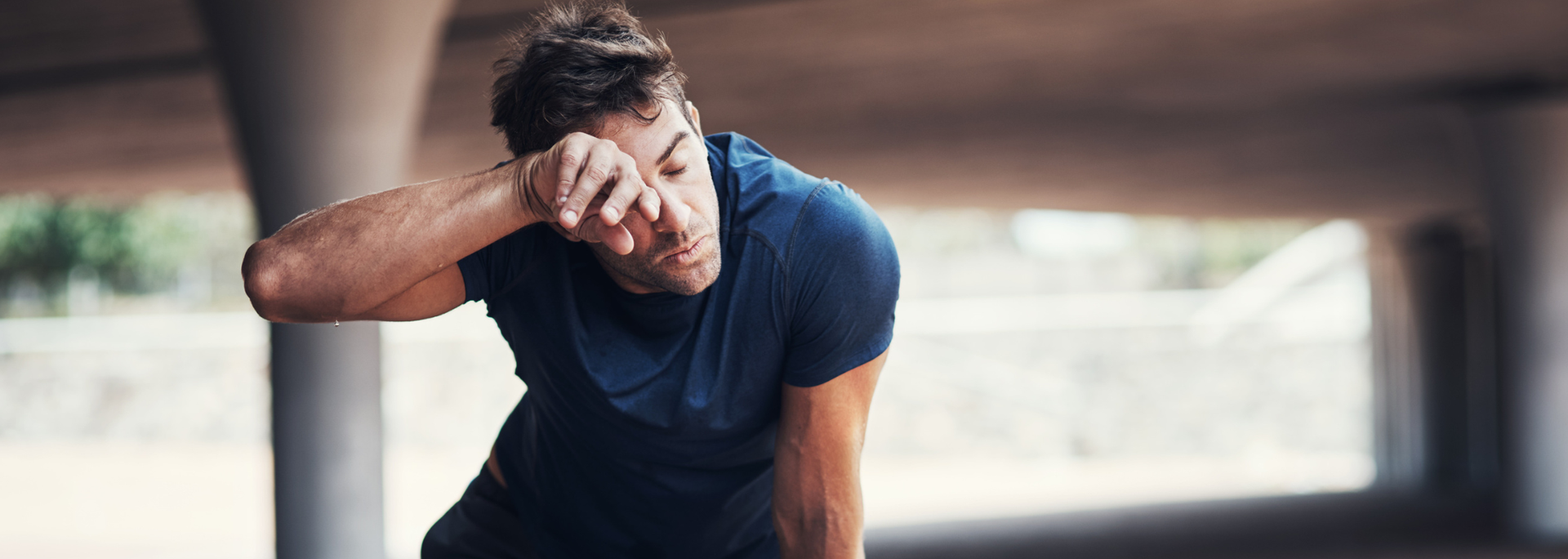 Picture of a person exhausted after exercise.  