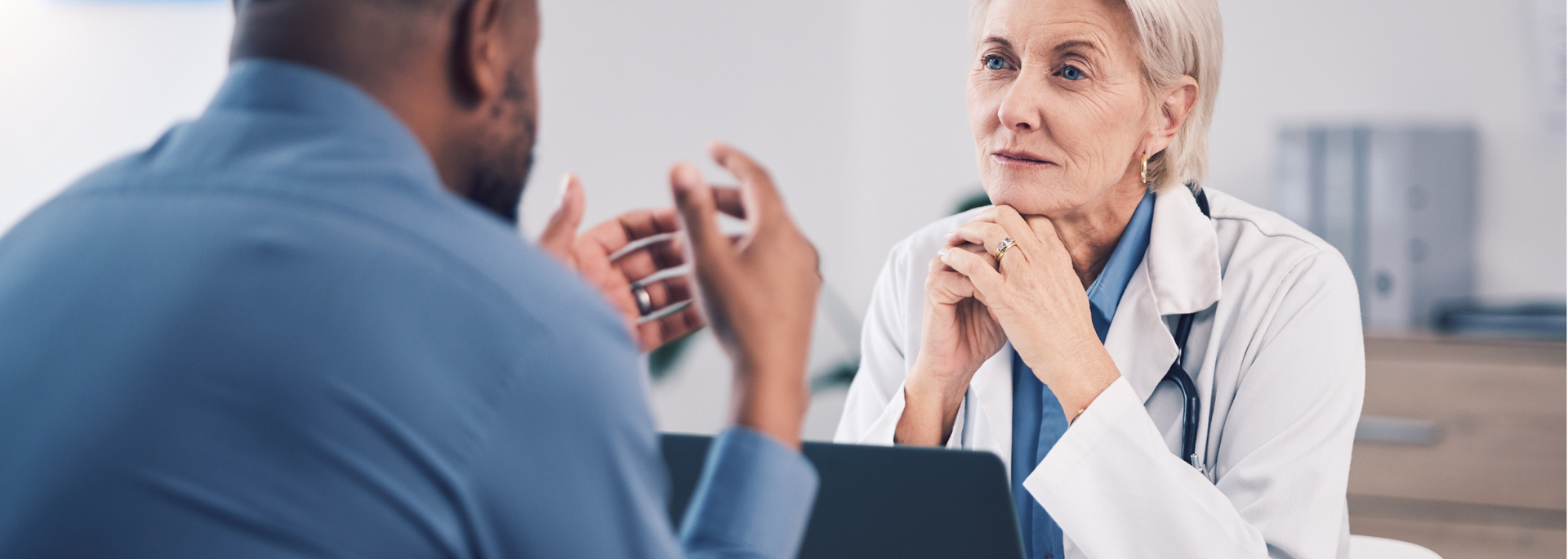 Picture of a person in consultation with a doctor. Picture of a person in consultation with a doctor.