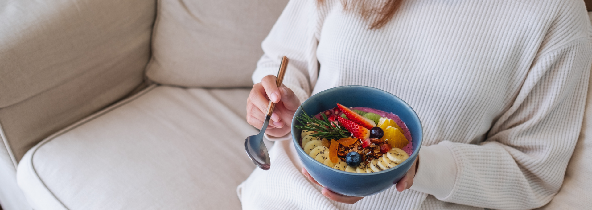 Picture of a person savouring a light healthy meal. 