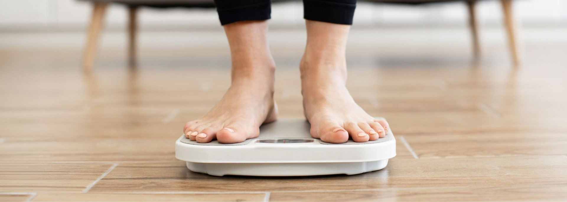 Picture of close-up of scales while a person stands on them.