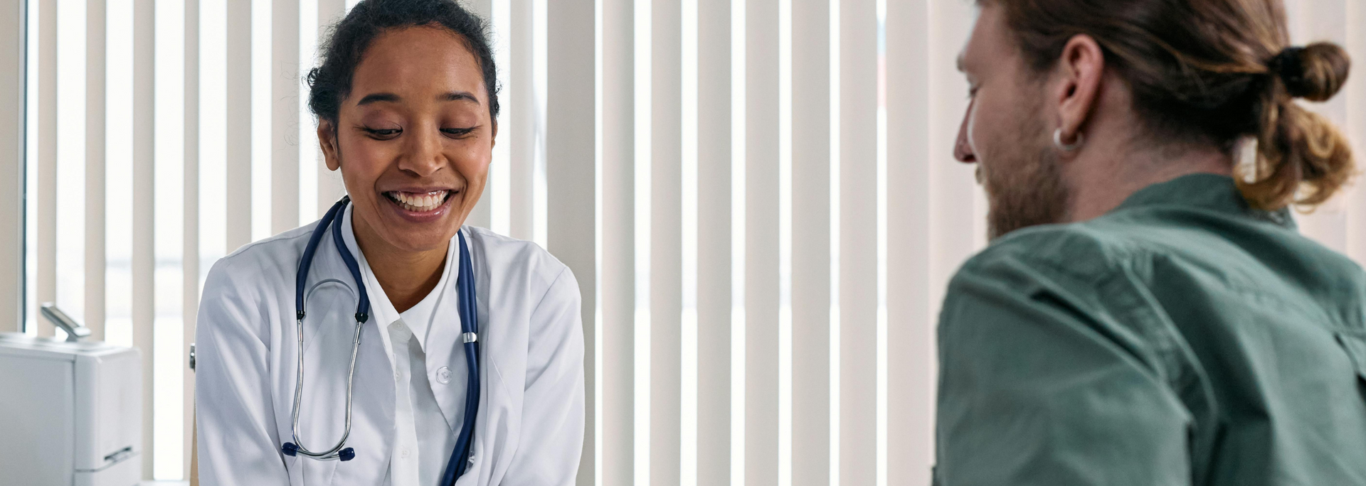 Picture of doctor with a patient.