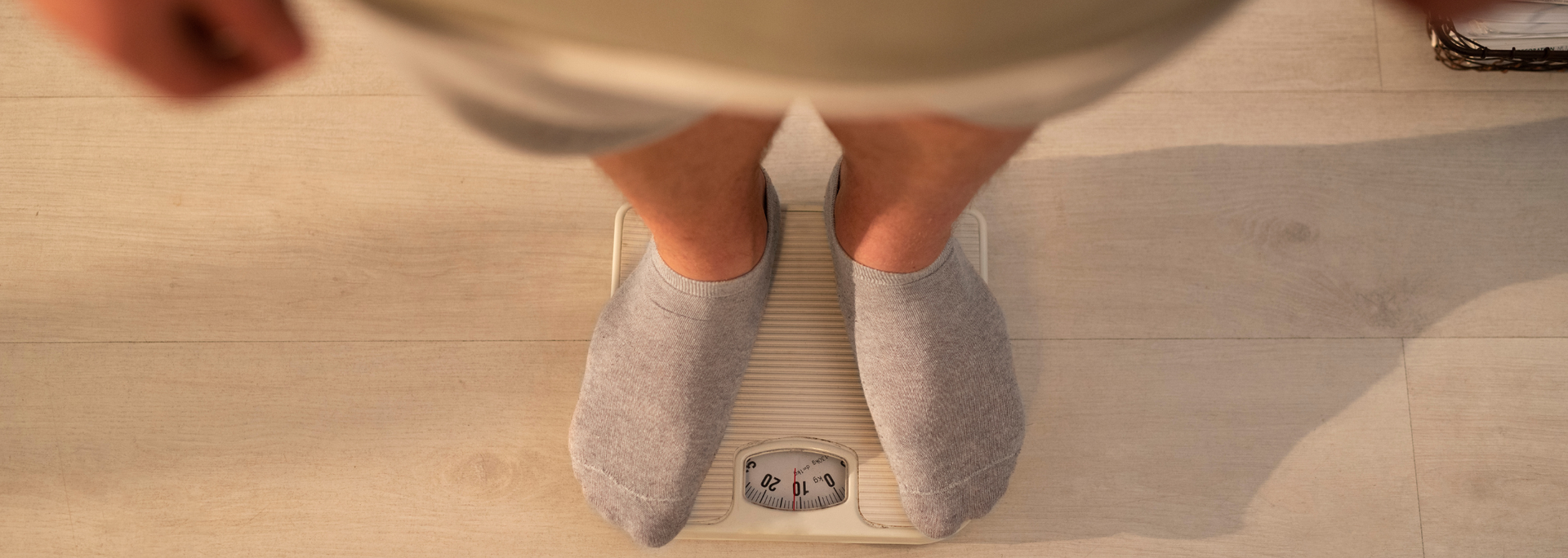 Picture of feet on scales. Picture of feet on scales.