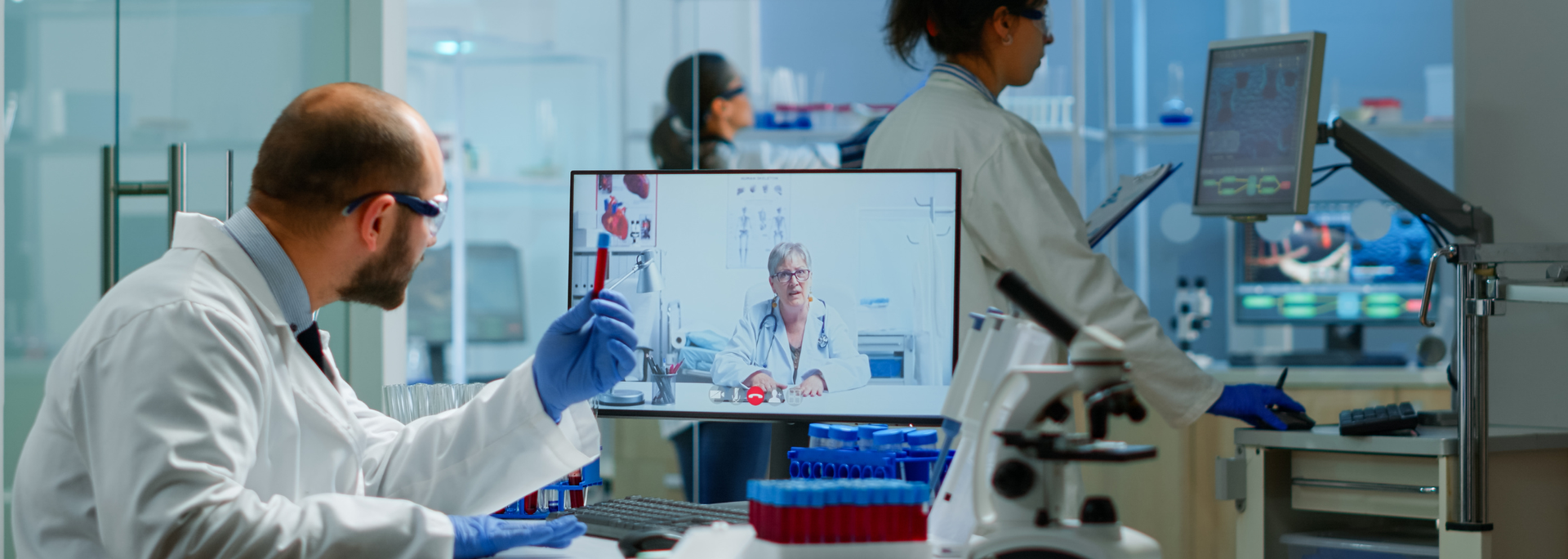 Picture of medical research staff in lab. Picture of medical research staff in lab.