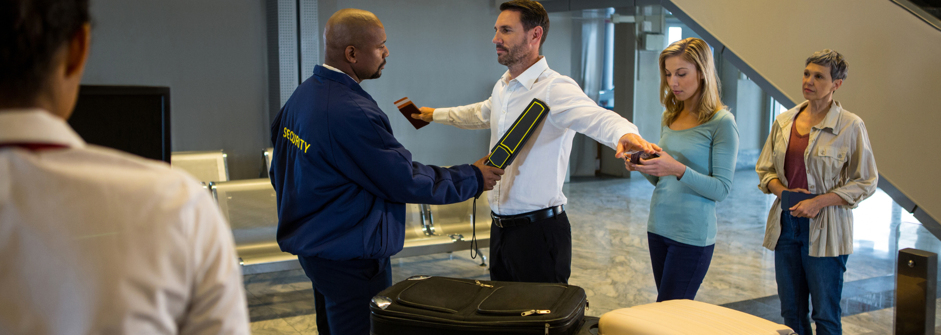 Picture of people at airport security. 