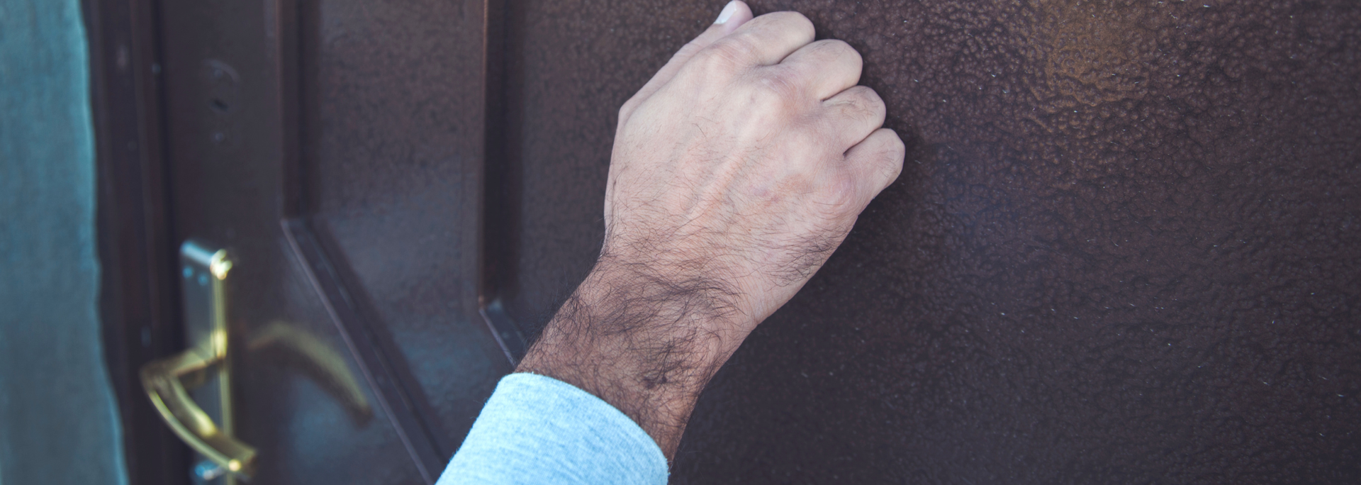 Picture of someone knocking on a door. Picture of someone knocking on a door.