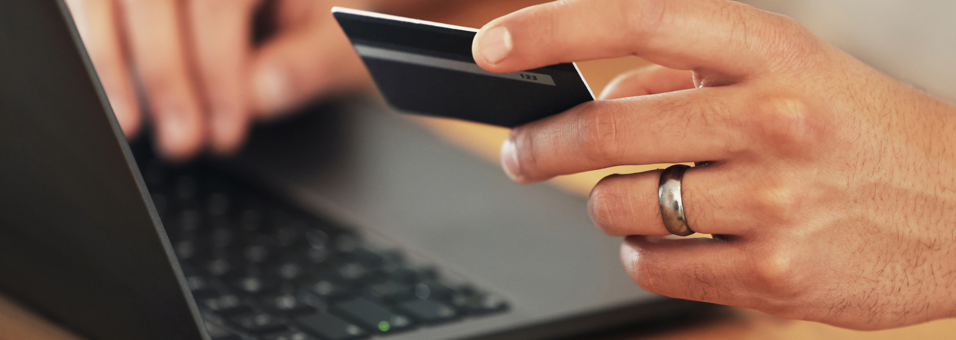 Picture of someone making an online purchase. Picture of someone making an online purchase.