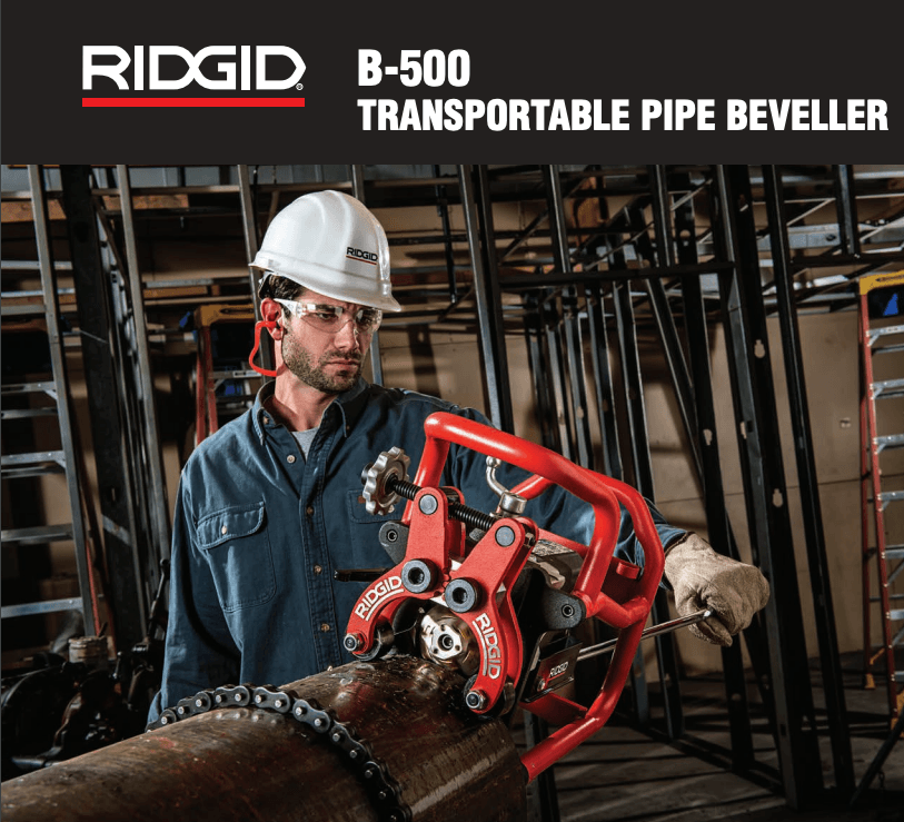 A man wearing a hard hat is working on a pipe.