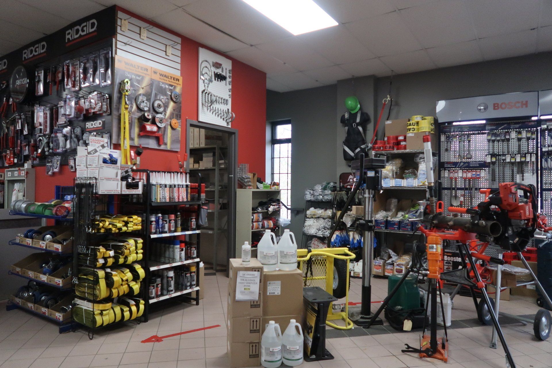 A store filled with lots of tools and a sign that says ridgid