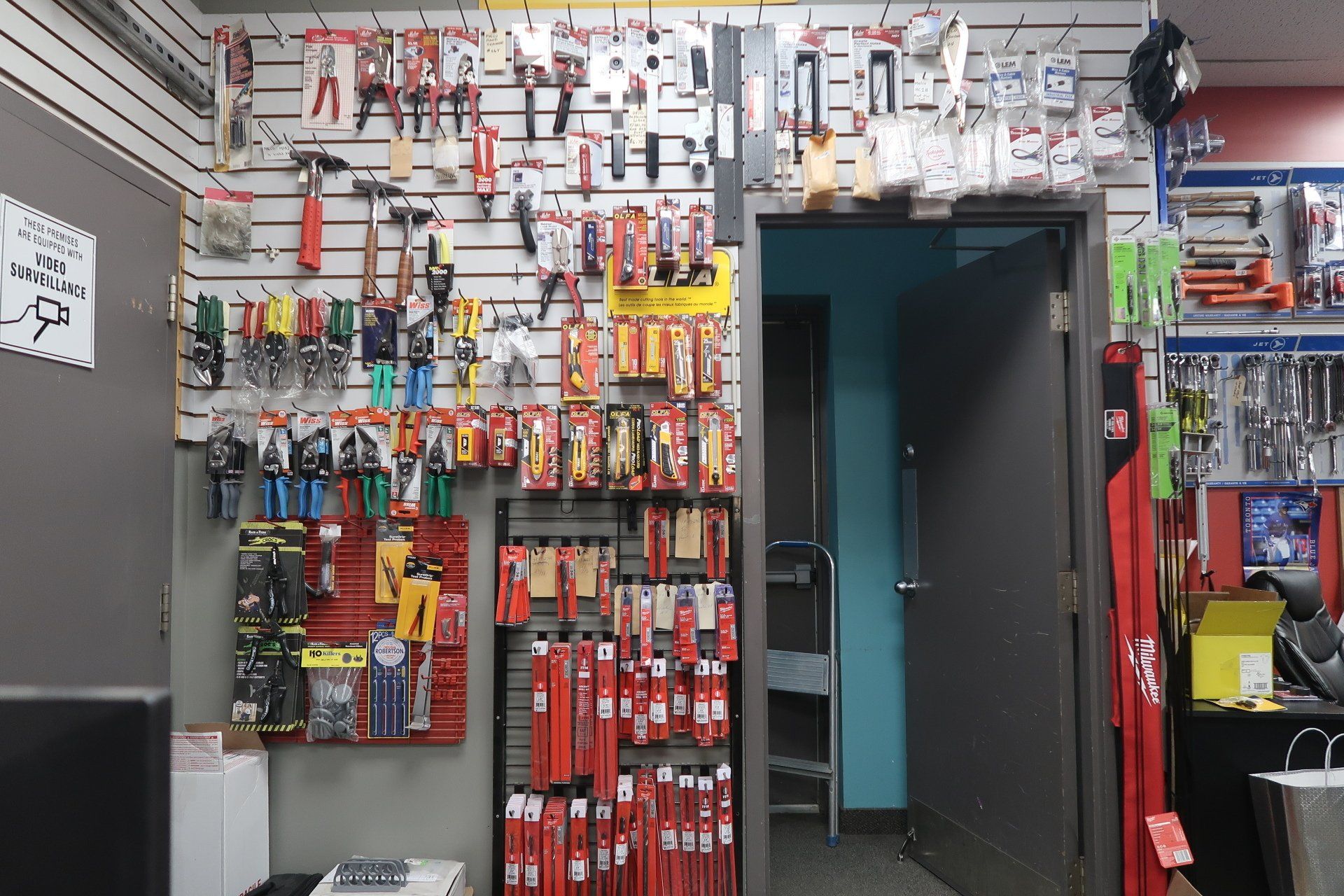 A store filled with lots of tools including hammers and pliers