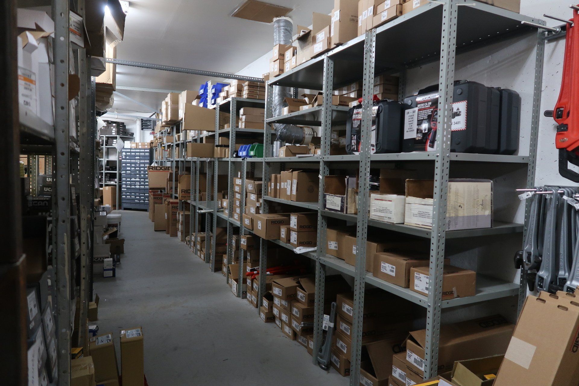 A warehouse filled with lots of shelves and boxes.
