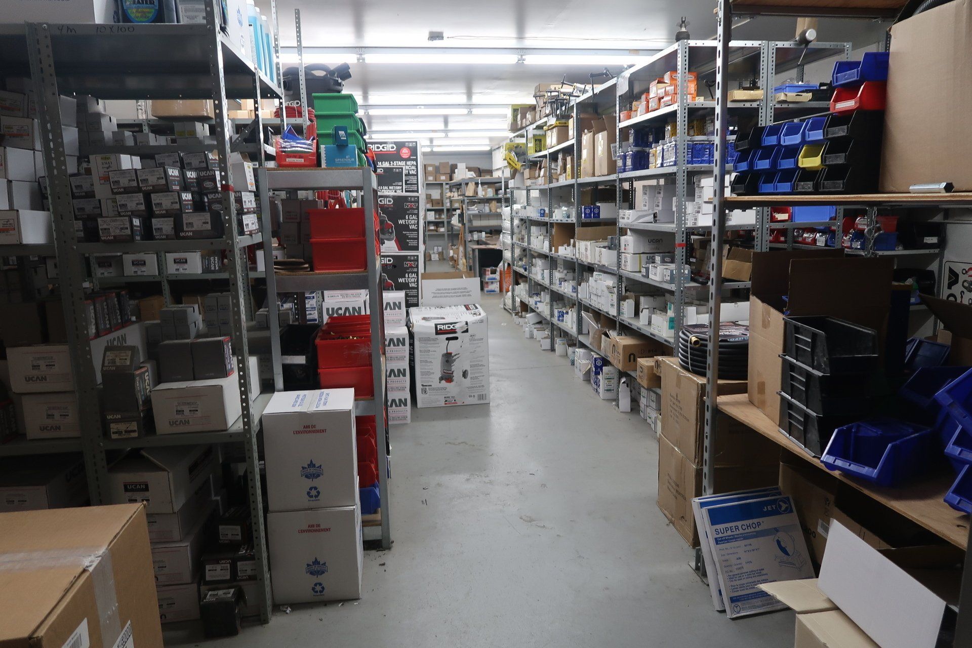 A large warehouse filled with lots of boxes and shelves