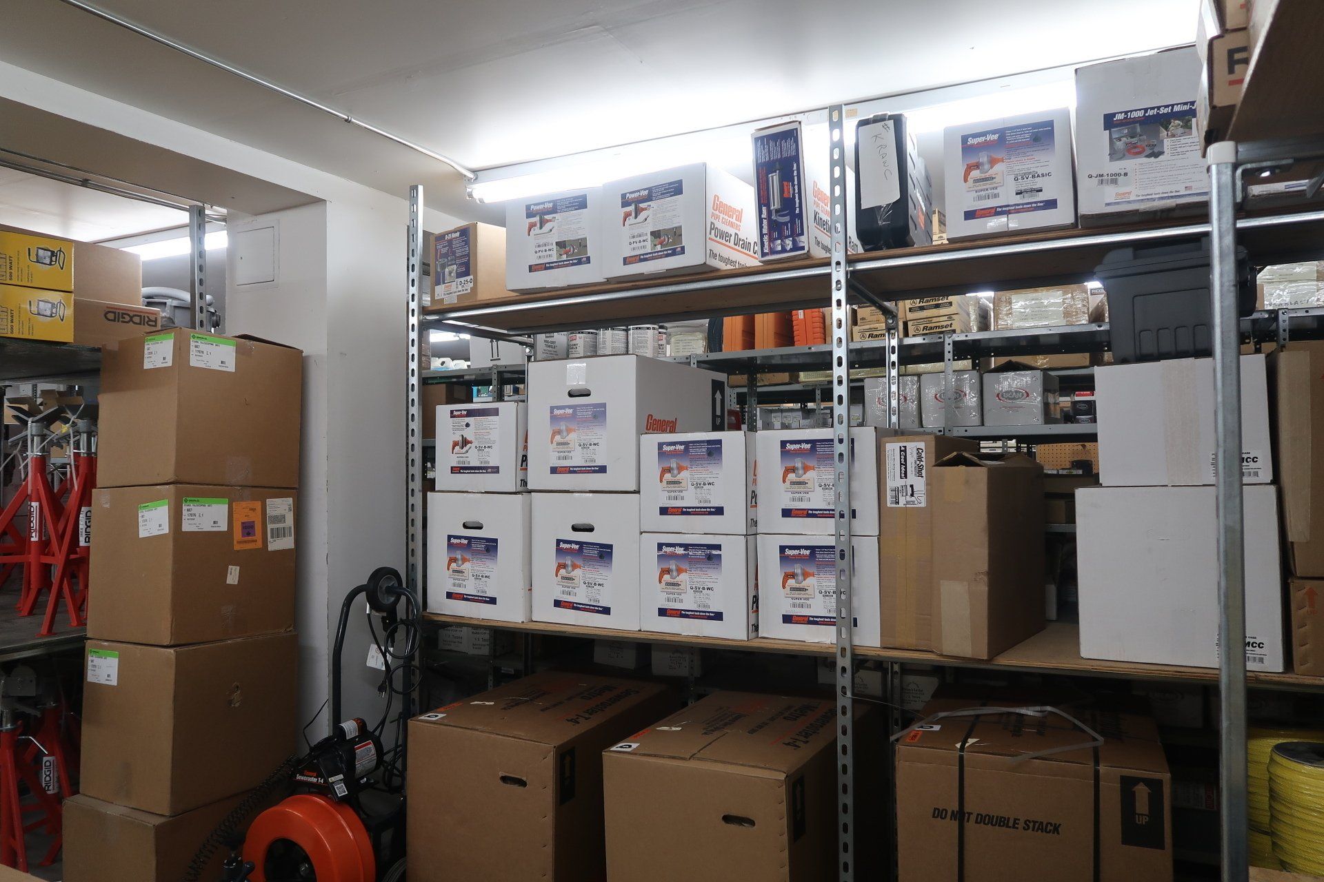 A warehouse filled with lots of boxes and shelves