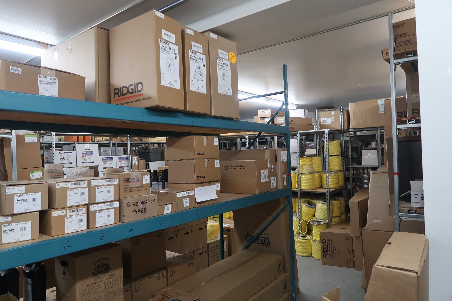 A warehouse filled with lots of boxes including one that says ridgid