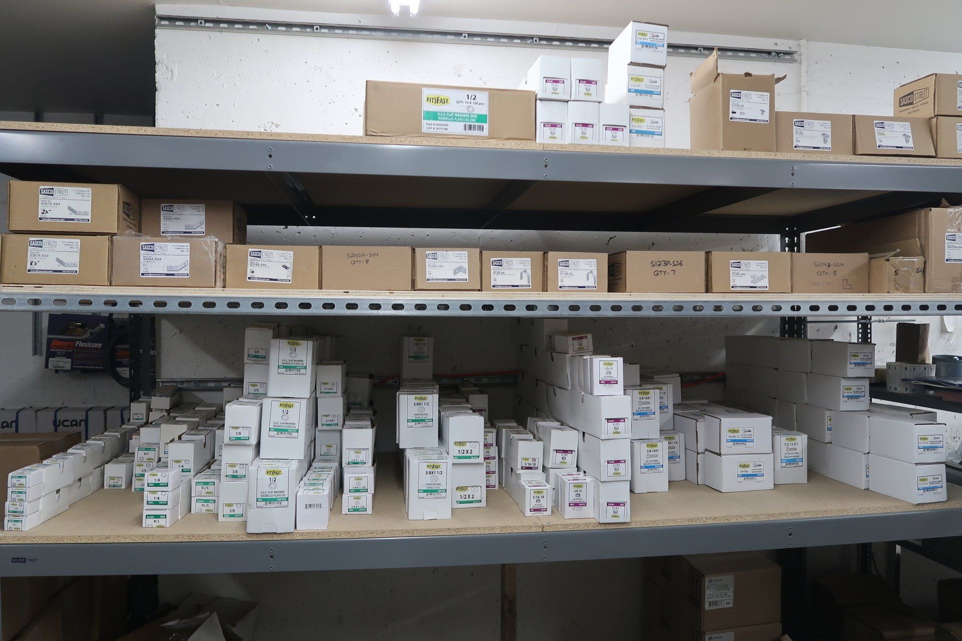 A warehouse filled with lots of boxes and shelves