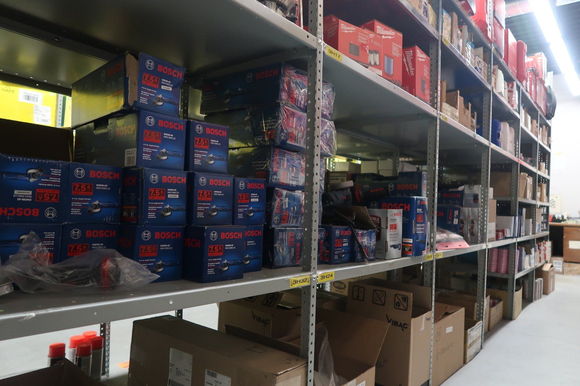 A warehouse filled with lots of boxes and shelves.
