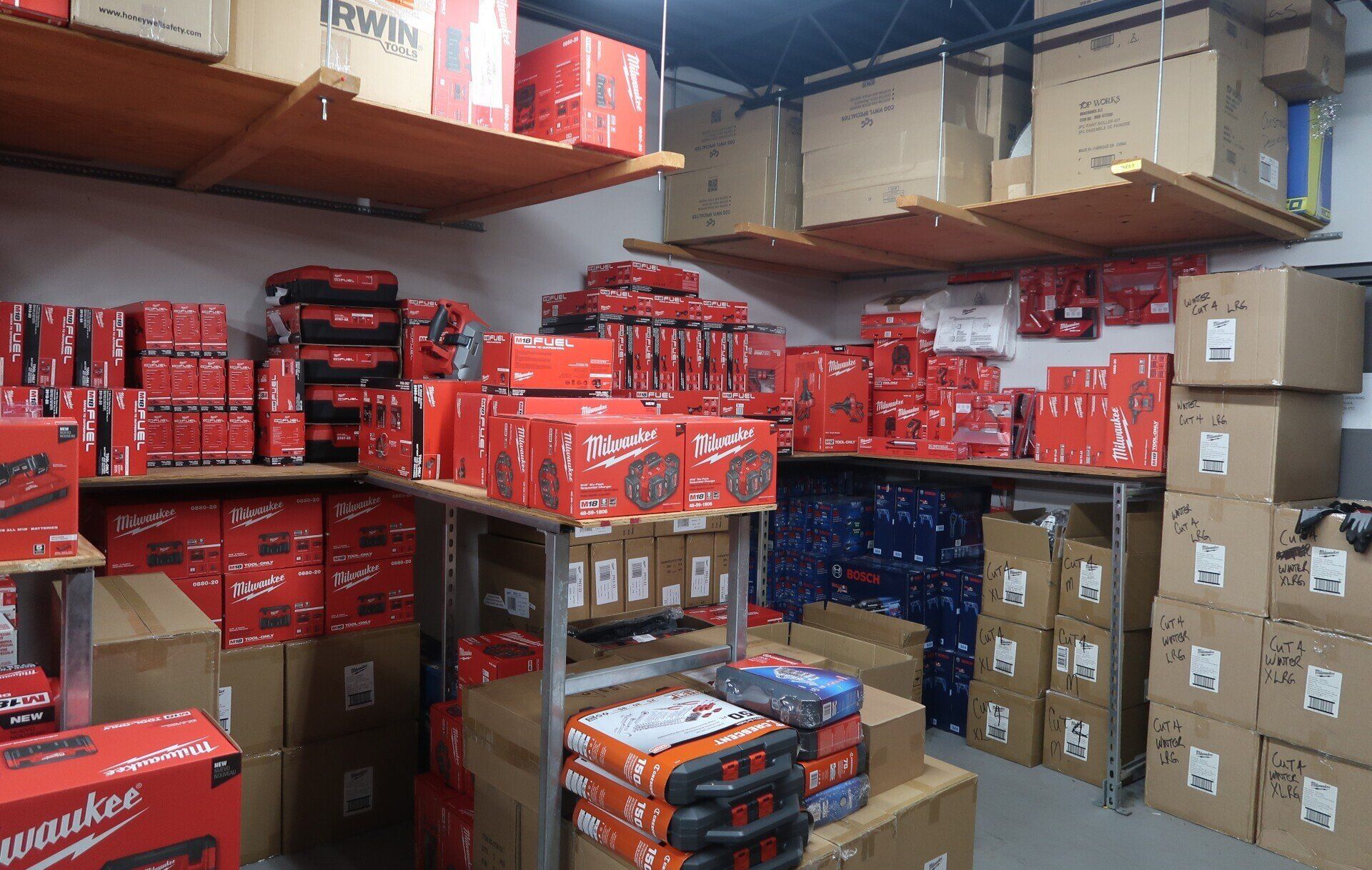 A warehouse filled with lots of boxes and shelves.