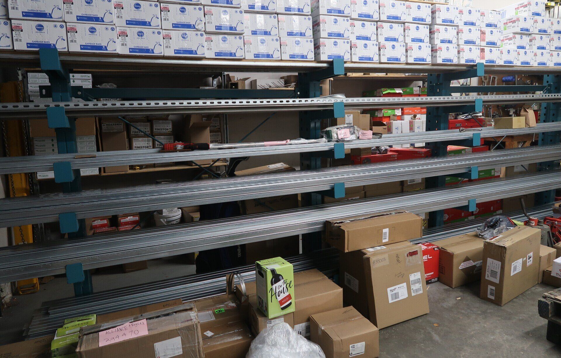 A warehouse filled with lots of boxes and shelves