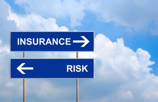 Insurance and risk on blue road sign - Commercial Insurance in Hemet, CA
