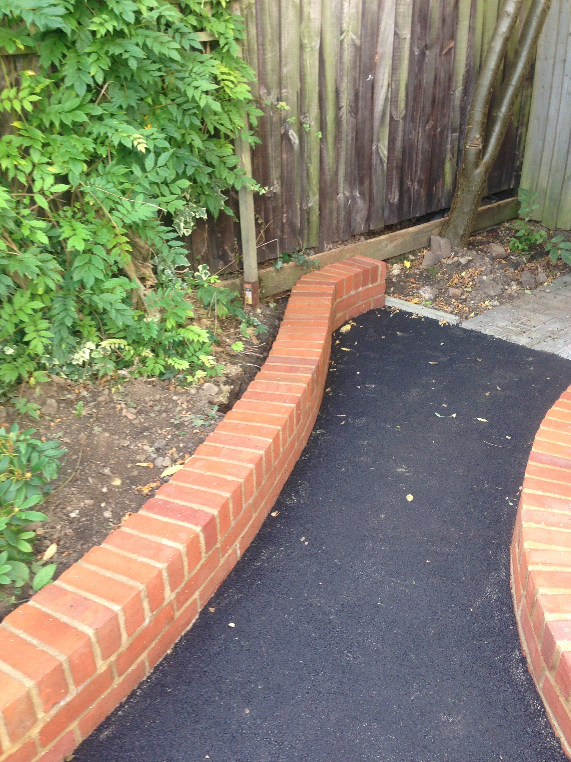 footpath with brick walls