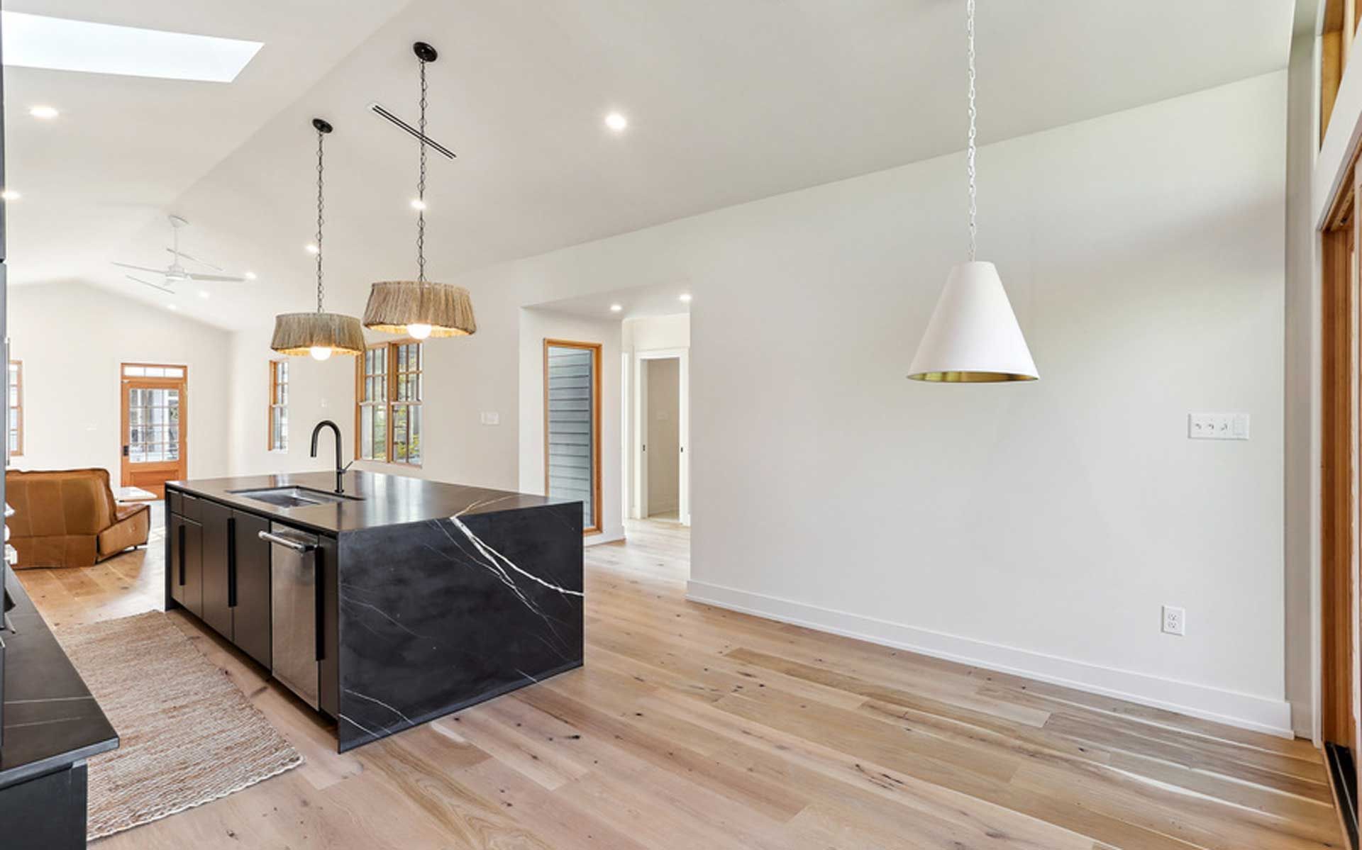 There is a large island in the middle of the kitchen.