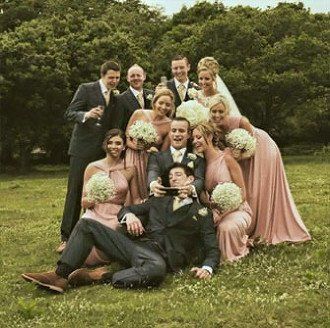 The charcoal suits with blush pink is a stylish, modern attire, we love this look!