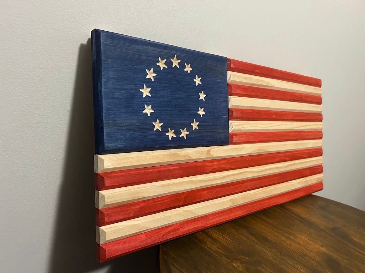 Wooden Betsy Ross flag, blue canton with white stars, red and white stripes.