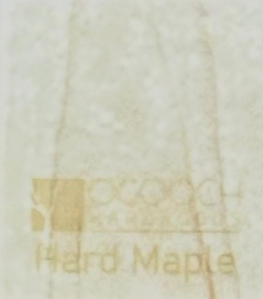 Wooden cabinet displaying various wood samples on a workbench.