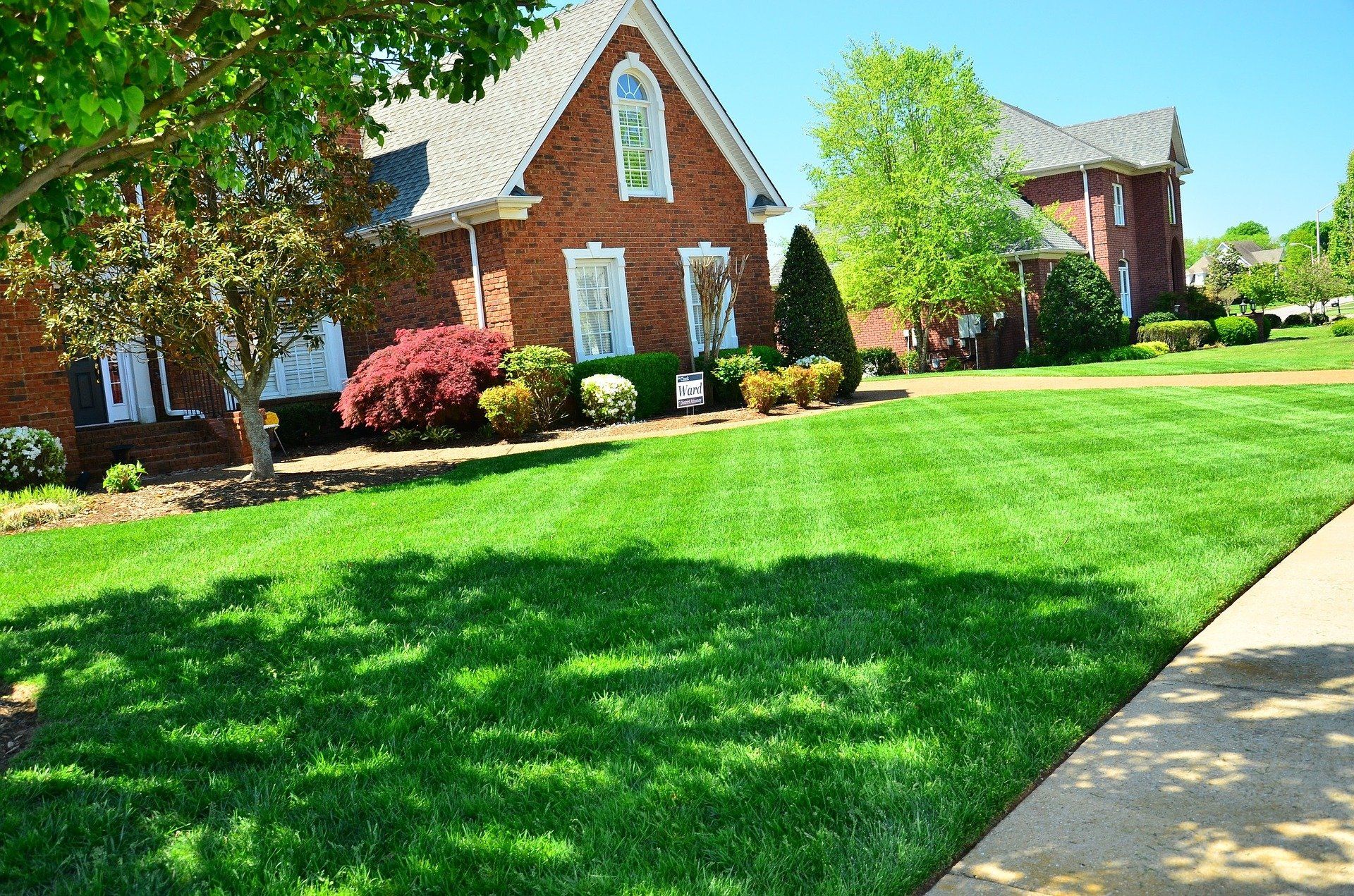 Suburban home with large front lawn