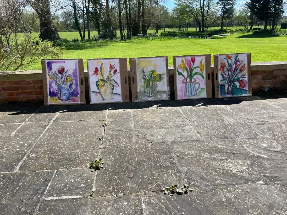 Debbie Nuttall Artist Wild & Wonderful Workshop | four framed paintings of flowers in vases on a patio