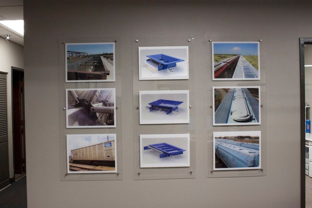 A wall with a bunch of pictures on it