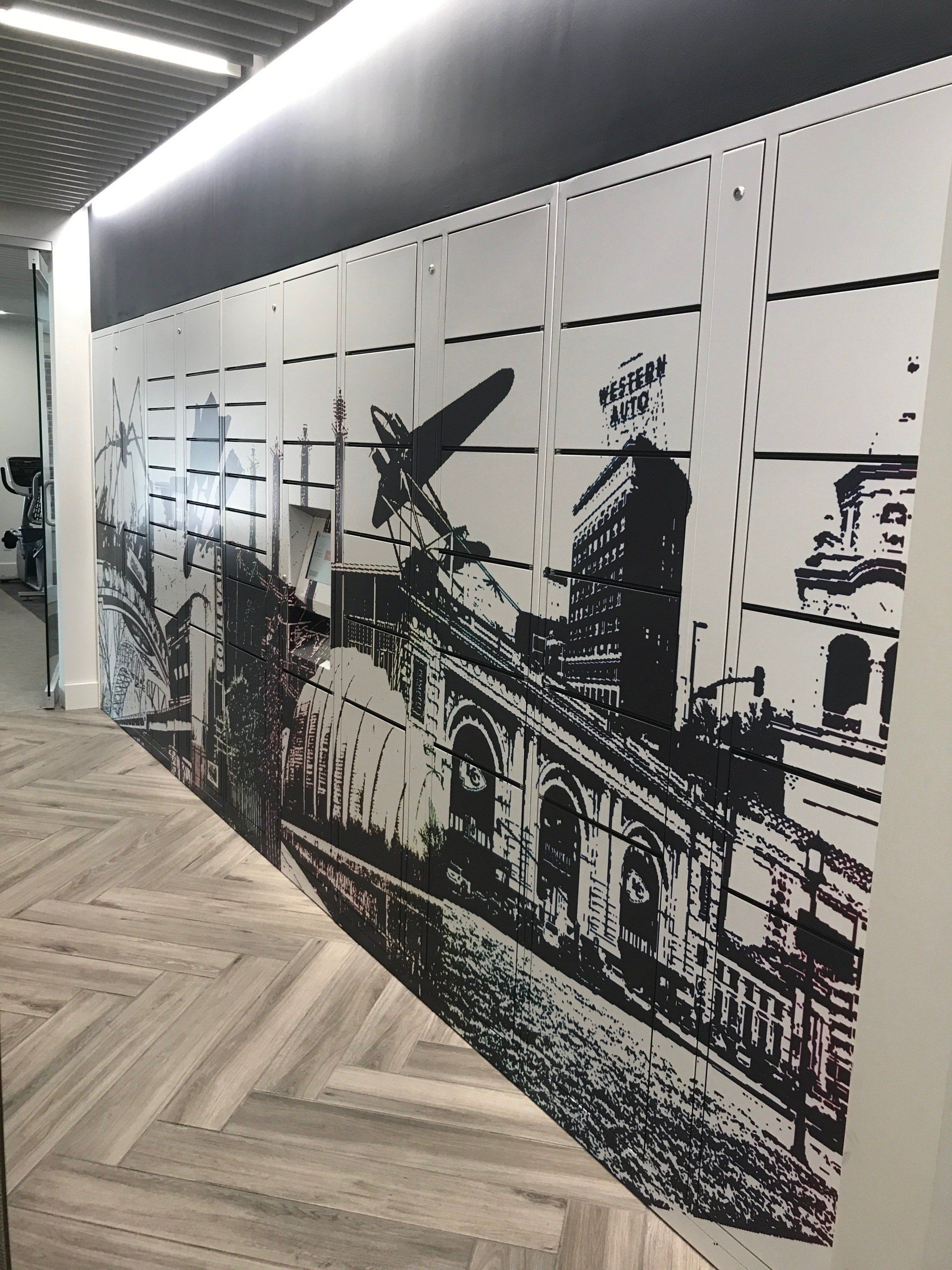 A wall with a picture of a city on it