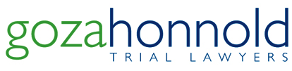 The logo for gozahonnold trial lawyers is green and blue.