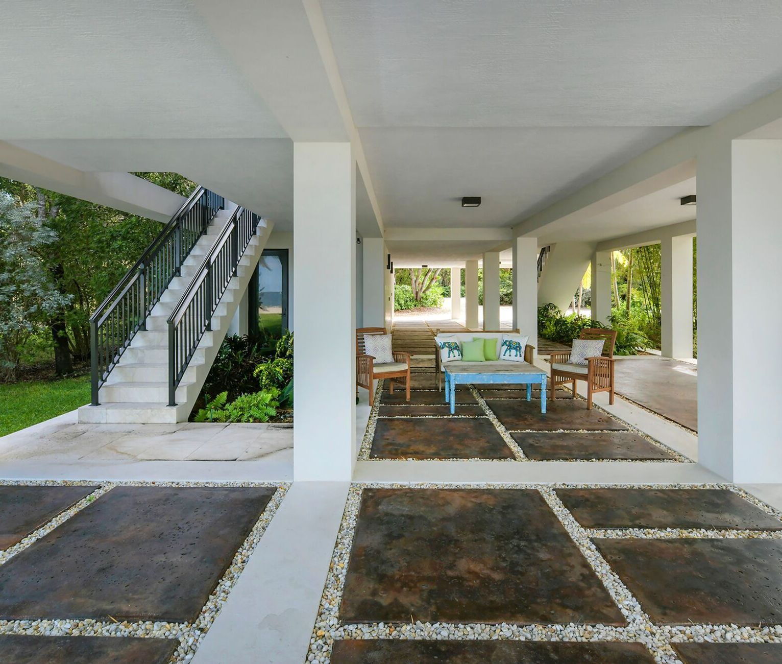 A house with a staircase leading up to the second floor