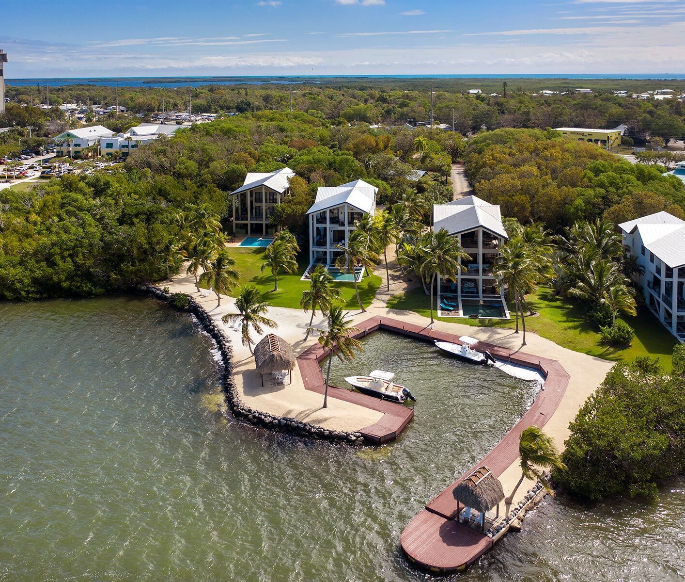 An aerial view of a small island in the middle of a body of water