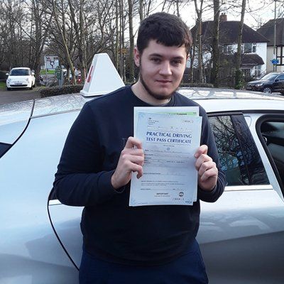 student with practical driving certificate