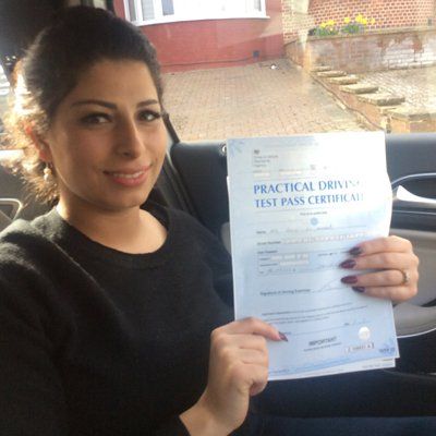 woman with pass driving certificate