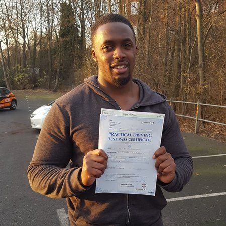 man with practical driving test pass certificate