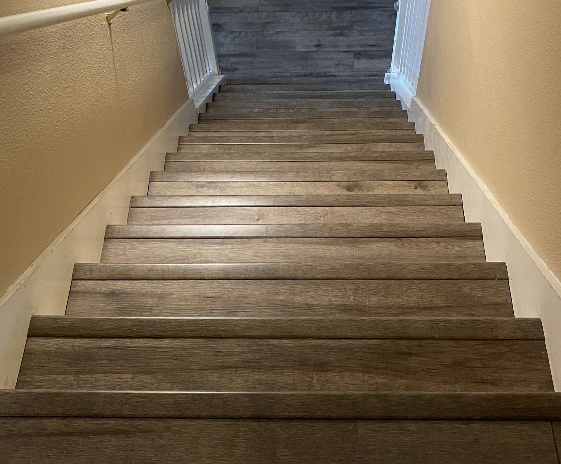 A set of stairs leading up to the second floor of a house.