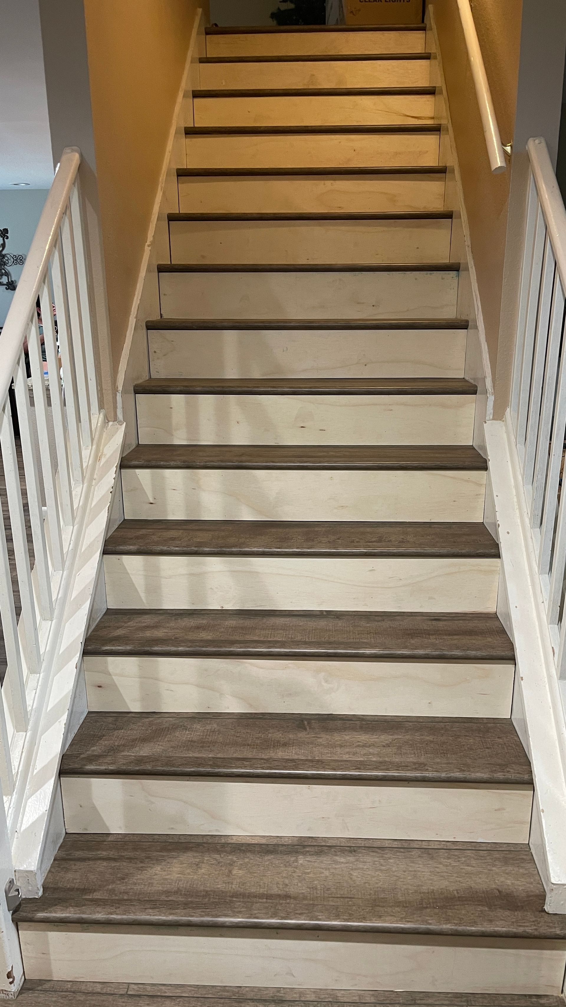 A set of stairs leading up to the second floor of a house.