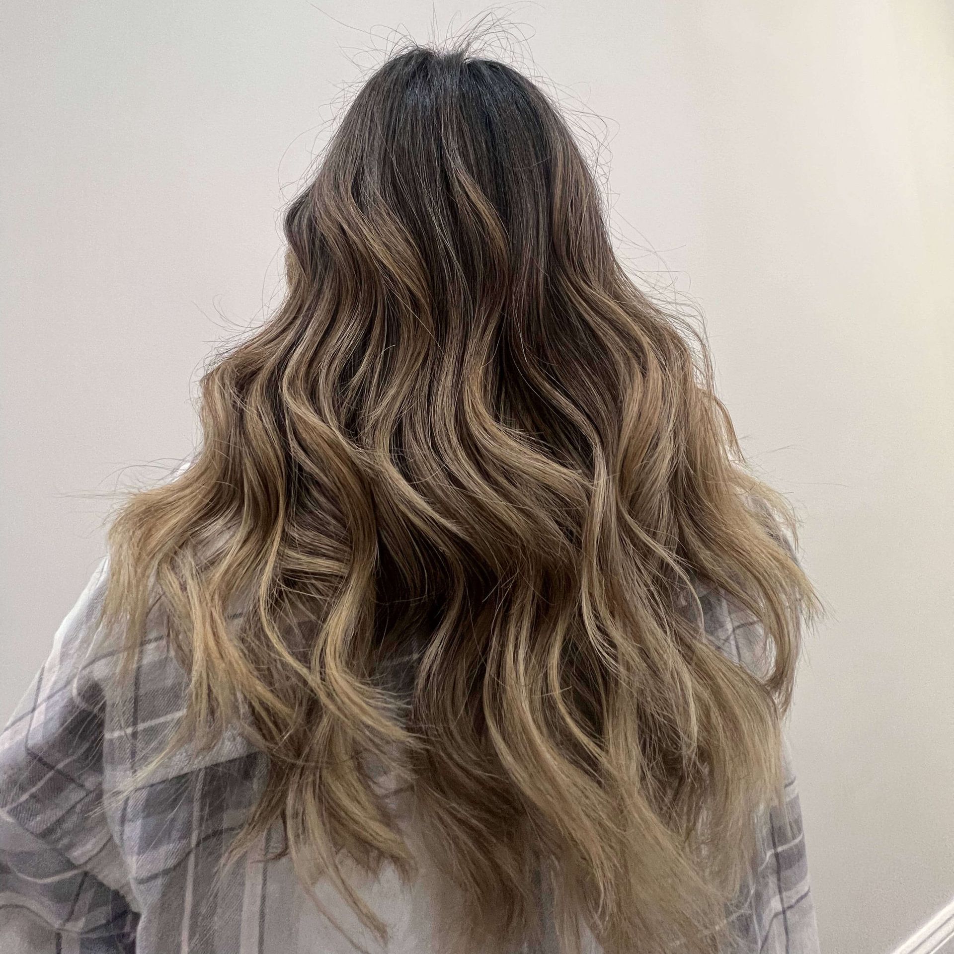 Woman with recently cut ombre, wavy hair