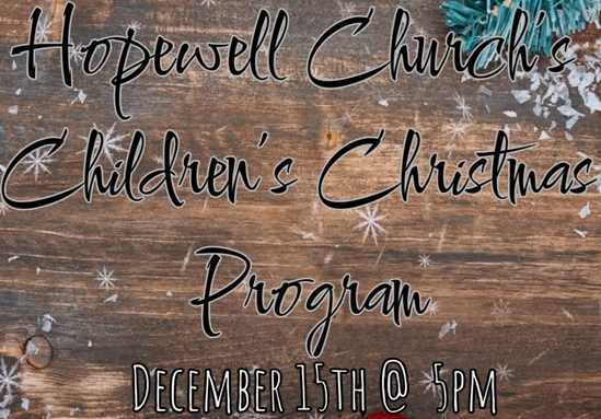 A wooden sign with the words `` hopewell church 's children 's christmas program '' written on it.